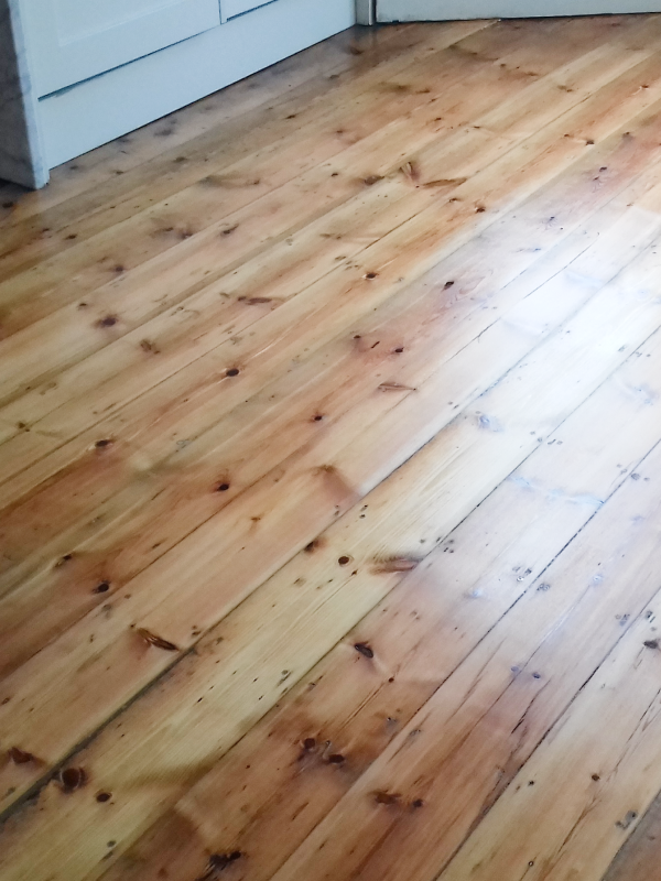 An image of a reclaimed wood flooring